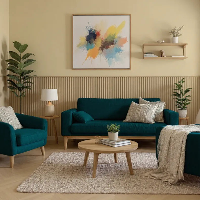 Modern living room with teal sofa, armchair, and coffee table.